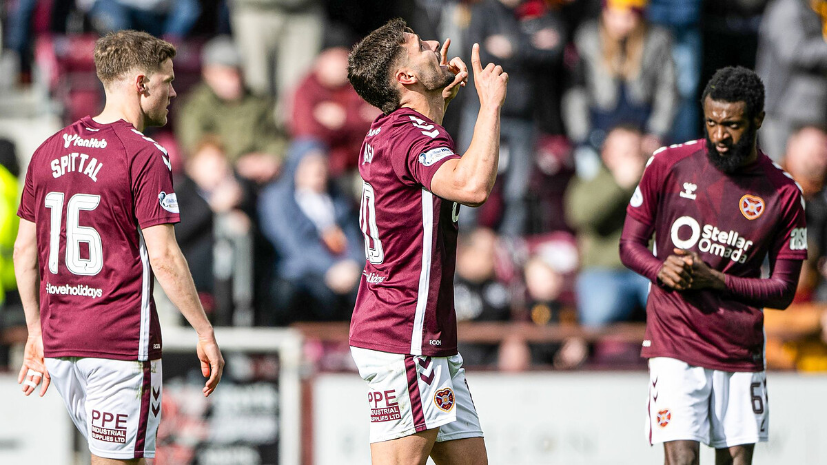 Hearts seal late win against Motherwell to maintain lead at top