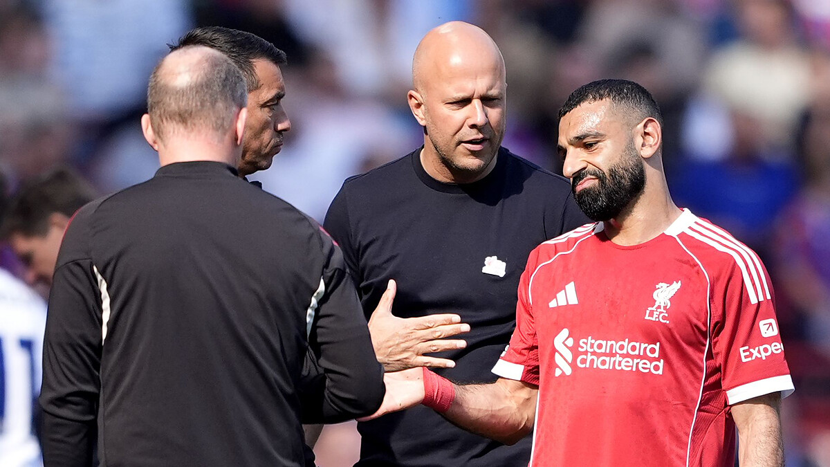Liverpool up to fourth but Salah injured in eventful Palace win