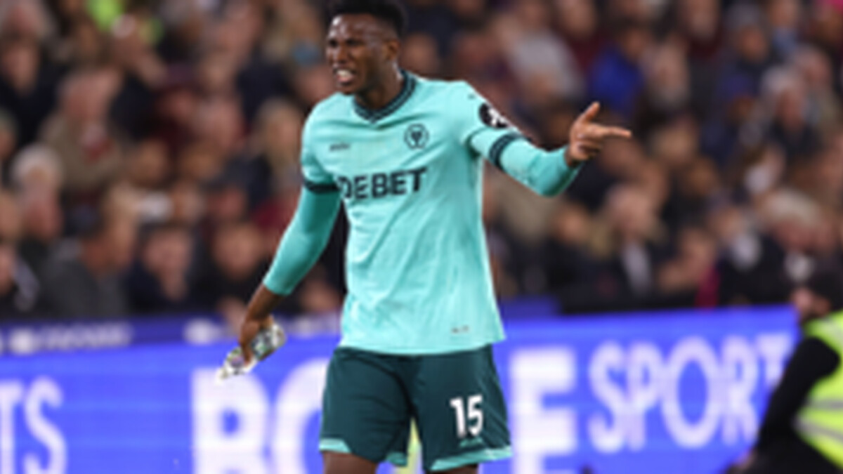 Who is one card away from suspension in the Premier League?