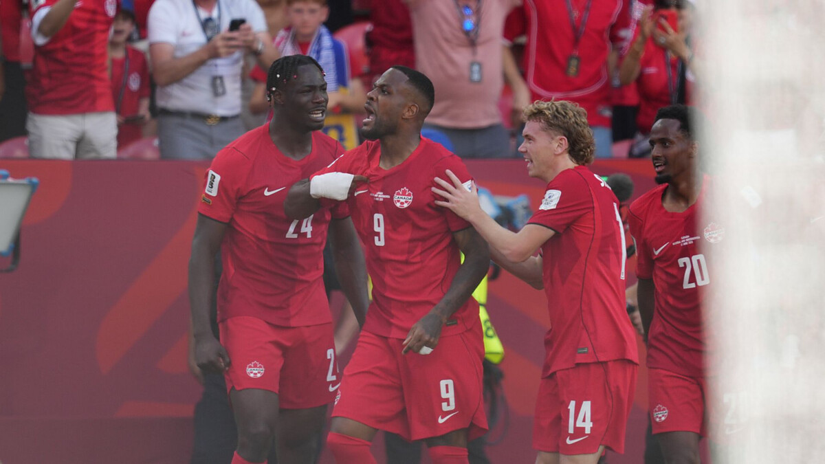 Canada rescue draw against Bosnia to claim first World Cup point