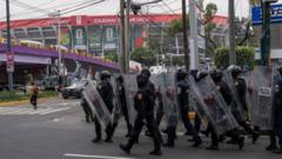 World Cup fever meets protest in Mexico City