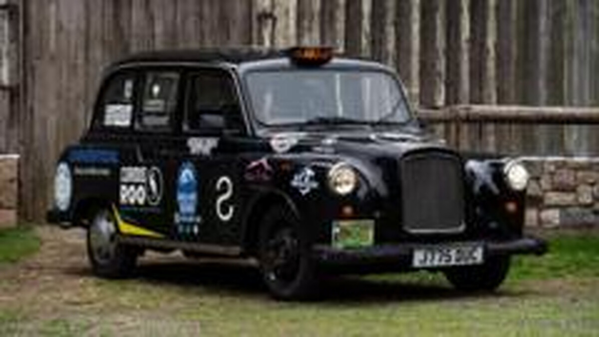 Meet the duo visiting all 16 World Cup venues in a London cab