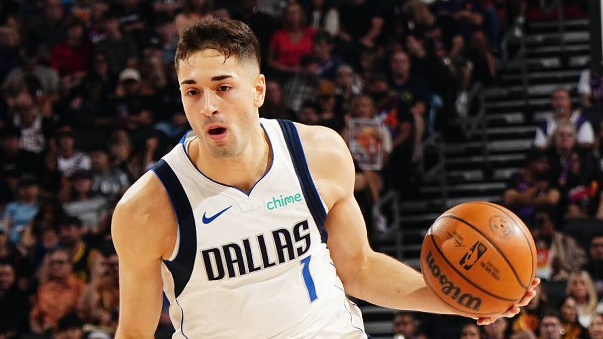 The Dallas Mavericks have waived guard John Poulakidas